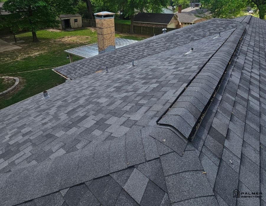 Asphalt shingle roof and ridge vent overview during a professional home inspection in Longview, TX, showing how Annual Inspections Give Homeowners Peace of Mind by identifying potential issues early.